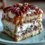 A 9x13-inch Butter Pecan Tres Leches Cake with a drizzle of toasted nut topping. 