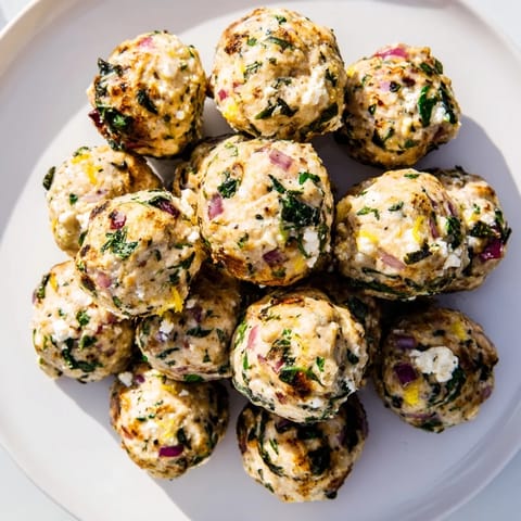 Sizzling Spinach Feta Turkey Meatballs: Enjoy this flavorful Greek-inspired, baked meatball dish.